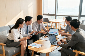 Business team in meeting with data charts