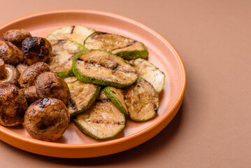 Grilled green zucchini slices, vegetarian food. Green barbecue zucchini