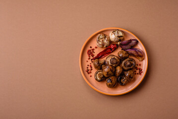 Grilled mushroom pieces, a vegetarian healthy meal with sauce. Barbecue mushroom halves