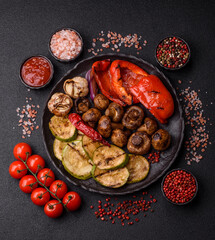 Grilled vegetables, bell peppers, mushrooms, and zucchini, a vegetarian meal. Grilled vegetables