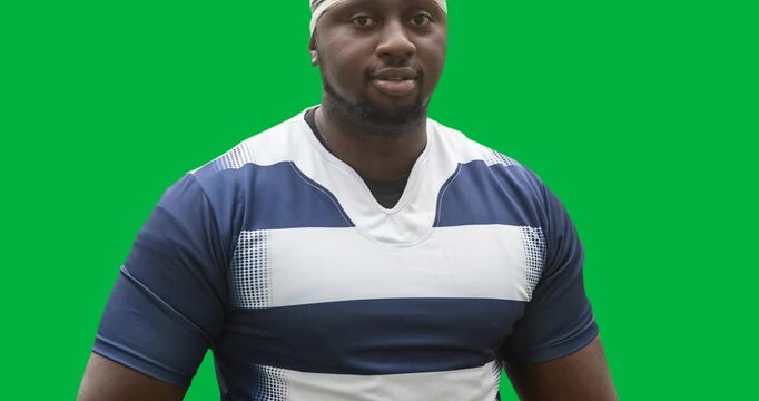 African american male rugby player holding rugby ball against copy space on transparent background