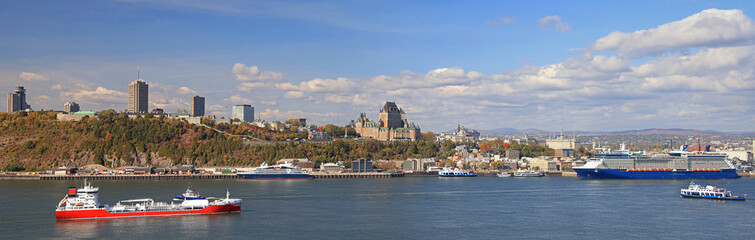 Quebec City skyline in autumn with Saint Lawrence River on the foreground, Canada