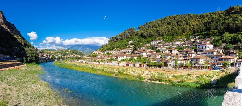 Historical Ottoman Houses in neighborhoods Gorica and Mangalem in Berat, with bridges over river Osum, Albania.