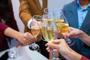A group of beautiful girls at a company party, drinking, celebrating New Year, club party with friends.