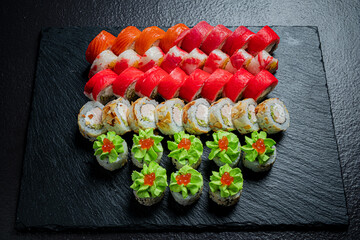 A vibrant array of sushi pieces captivates the senses with its colors and intricate designs