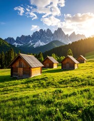 Fototapeta premium Scenic alpine huts nestled in lush green meadows under blue sky