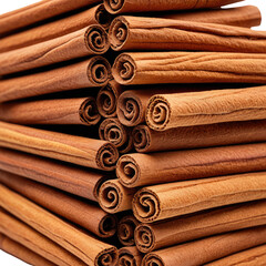 Stacked cinnamon sticks show the texture of bark and rolled structure