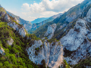  View of Sutjeska road in Bosnia and Hercegovina. Canon in Sutjeska  national park with towering rocks.