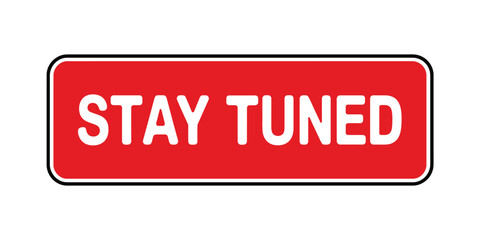 Bright red stay tuned sign with white text