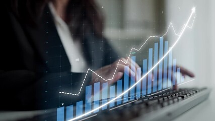 A business professional engages with digital financial data in an office setting, highlighting graphs that showcase growth trends and productivity insights for informed decision-making. Copula - Powered by Adobe