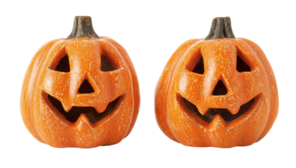 Two detailed jack o lantern pumpkins with carved faces on transparent background