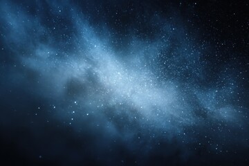 Fototapeta premium Dark night sky filled with white specks, capturing the vastness of the universe in a breathtaking celestial display during nighttime