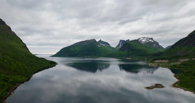 Scenic drone view from Bergsbotn viewpoint over Bergsfjord and mountains, Senja