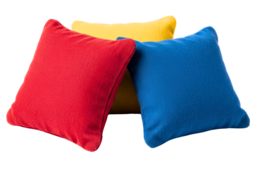 Red, blue, and yellow bean bags for a fun outdoor toss game isolated on a transparent background