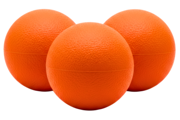 Three orange textured plastic playground balls for games isolated on a transparent background