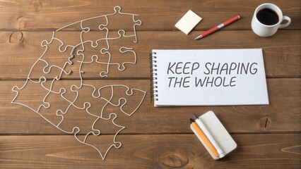 Inspirational message about growth and teamwork with puzzle pieces on a wooden desk background featuring a coffee cup