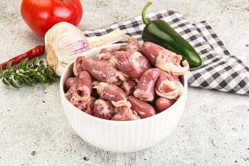 Fresh raw chicken hearts in the bowl