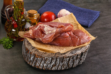 Raw uncooked turkey thigh fillet