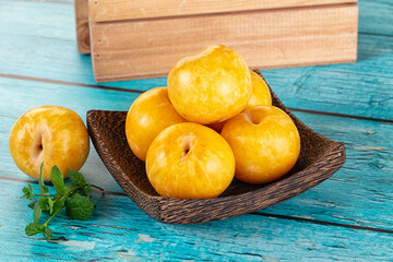 Raw ripe sweet yellow plums