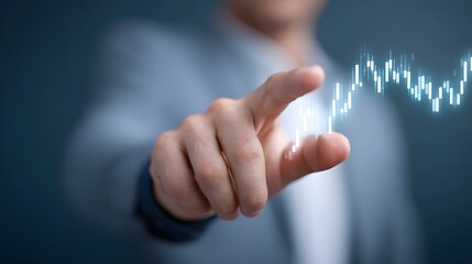 A person s hand touches a glowing blue holographic market graph symbolizing financial growth and digital analysis
