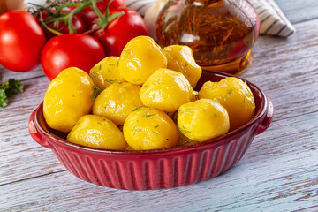 Boiled young potato with oil
