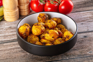 Baked small baby potato with herbs
