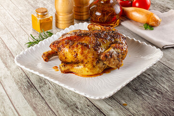 Baked in oven whole chicken with spices