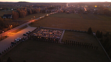 Cemetery illuminated with candles on All Saints Day in Poland