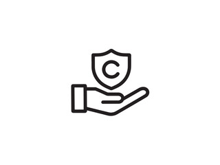 Hand holding shield with letter c, representing copyright isolated on white background