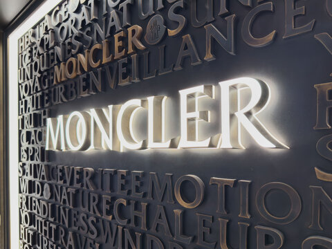 Moncler store sign illuminated at Singapore Changi Airport