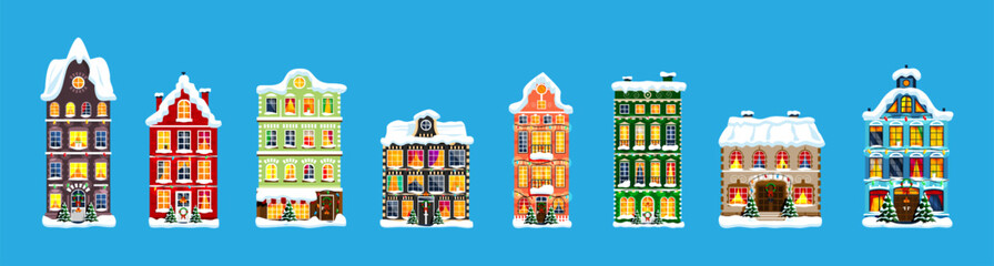 Collection of several colorful European Christmas building covered with snow and decorated with Christmas wreath and light garland