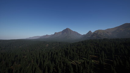 Obraz premium A breathtaking view of towering mountains under a clear blue sky, bathed in early morning light. The lush greenery below stretches as far as the eye can see, creating a serene atmosphere.