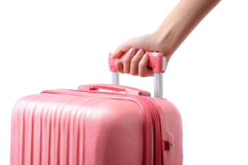 Hand holding the handle of a stylish pink suitcase ready for journey to travel and vacation getaway adventure representing personal luggage and holiday concept