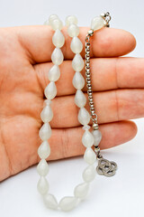 On hand white and silver beads sequenced, short rosary, tespih tesbih