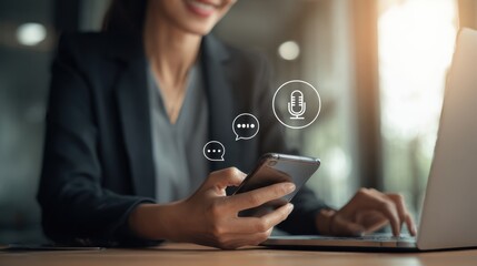 Woman using smartphone and laptop with communication and microphone icons overlaid
