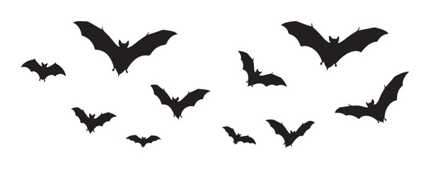 Silhouettes of bats flying, creating a spooky and Halloween-themed atmosphere.