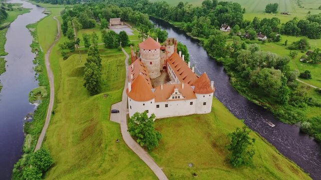 Aerial Cinematic Shot Of Bauska Castle Fortress Highlighting Baltic Travel Charm