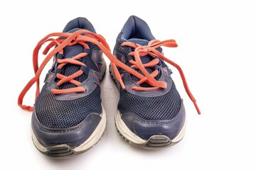 Blue Kids Sneakers with Orange Laces Isolated on White Background Fashion on transparent background