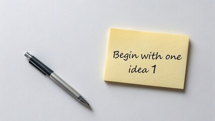 Simple concept of starting a project illustrated with a note and pen on a clean background for motivational themes