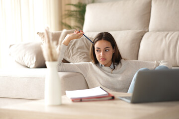 Bored student wasting time complaining at home