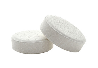 Two round white cleaning tablets isolated on transparent background, sanitation and hygiene product for household use