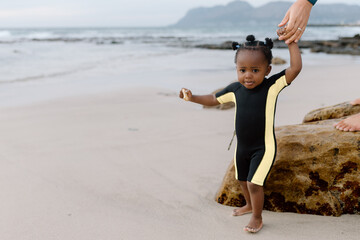 Diverse family on the Beach at sunrise