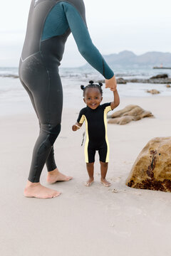 Young girl smiling on the beach