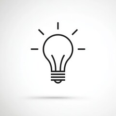 Fototapeta premium A light bulb icon featuring a shadow against a gray background