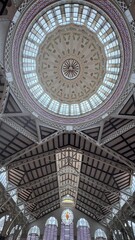 Architectural Grandeur: An impressive dome and intricate ceiling of a building. The design captures a sense of elegance, and architectural skill.