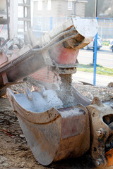 Mixer truck delivered concrete on construction site and unloaded on ground