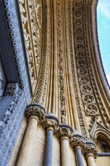 Carvings and sculptures along the arch doorway at Westminster Abbey in London, United Kingdom. Intricate details of craftsmanship.