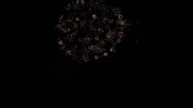 firework sky 2024. christmas. shining colorful golden firework sky. background glowing display new year. multicolor blur night. eve christmas. celebration fireworks. show real happy fortunate lights