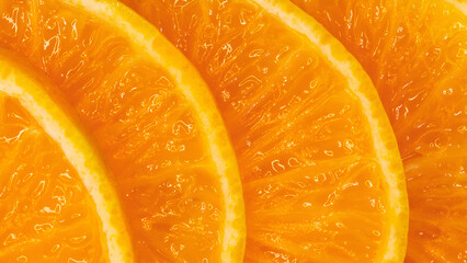 Orange fruit slices pattern. Healthy food background