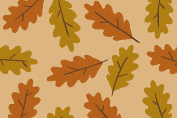 Fototapeta premium Autumn leaaves, ornage and yellow leafes on light brown background, oak leaves background design fall leaf background 